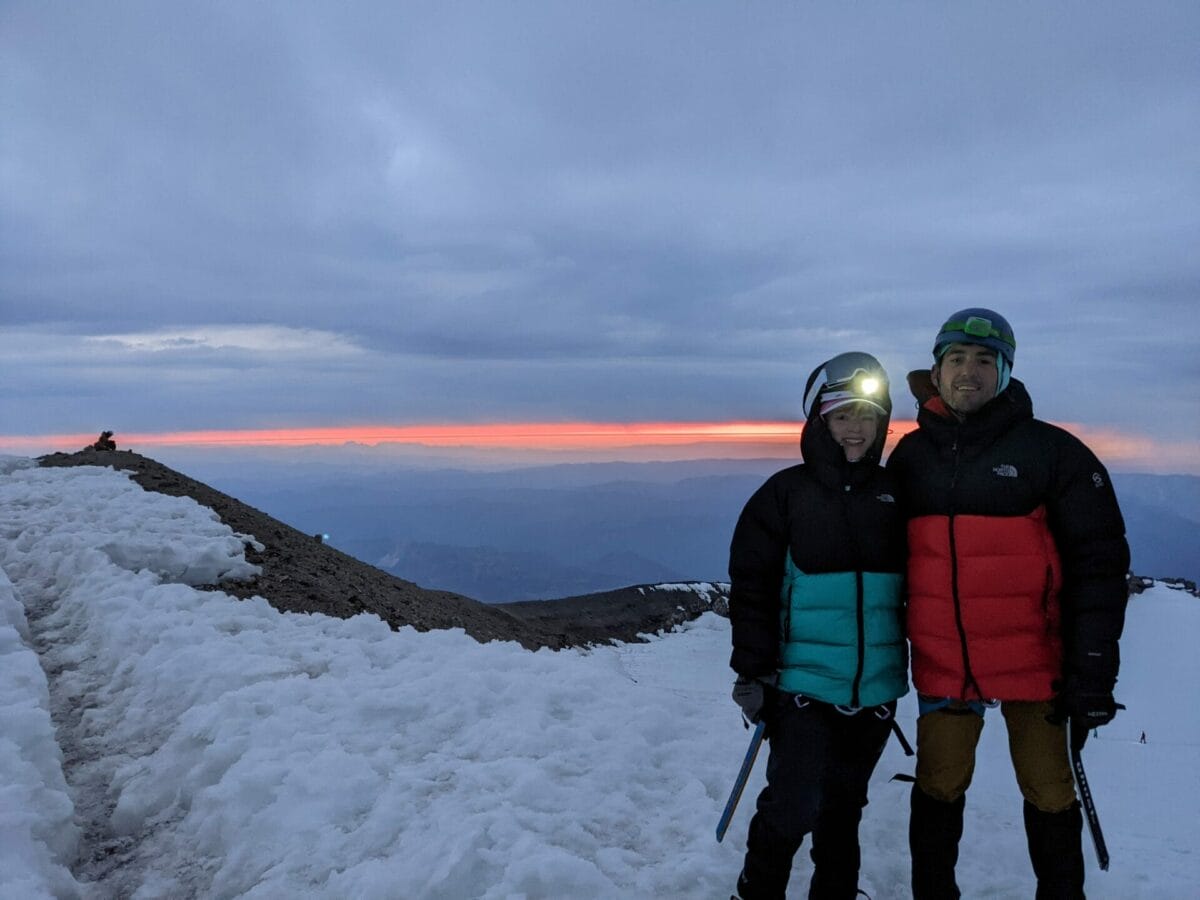 photo of Lindsay Christensen on the summit of Mt. Rainier
