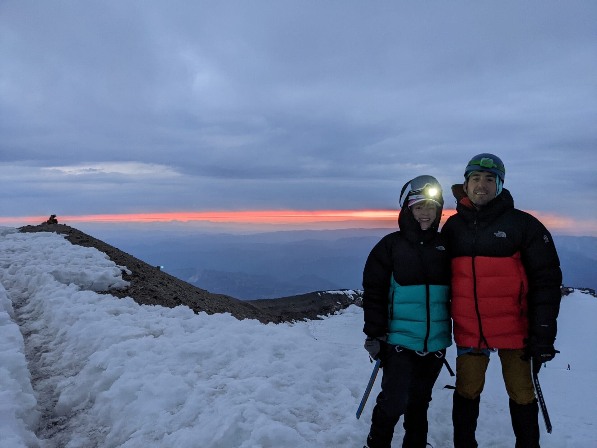 photo of Lindsay Christensen on the summit of Mt. Rainier