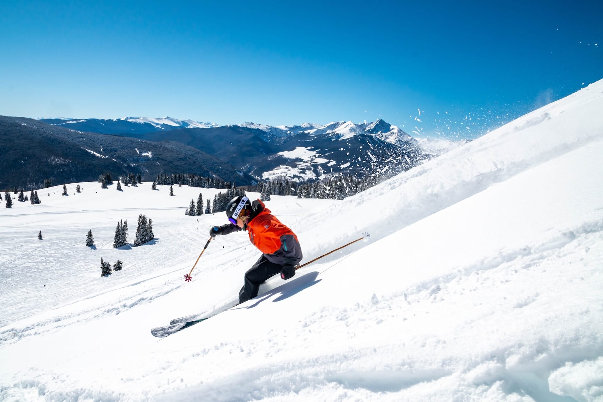 image of a skier skiing down a slope at Vail resort in Colorado